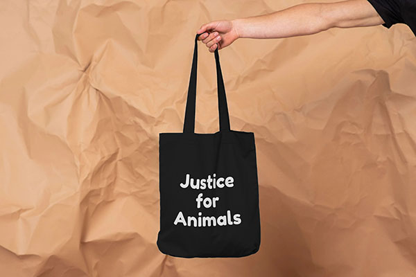 Free Justice for Animals Tote Bag