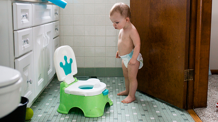 toddler who refuses to poop looking in toilet, when your toddler refuses to poop